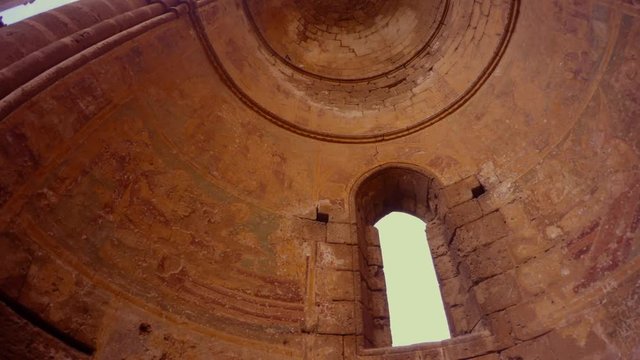remains of a Christian mosaic in an abandoned dome of an Orthodox temple from below