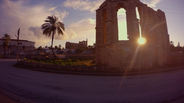 Evening sun from St. Latin's George Church ruin of an orthodox Christian temple on the outskirts of the ancient fortress of Famagusta