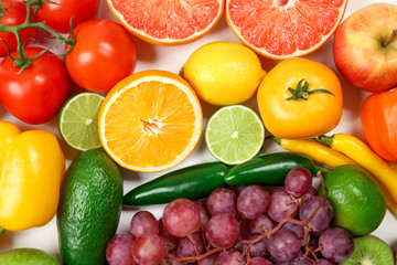 Naklejka na ściany i meble Many different fruits and vegetables on light background, closeup
