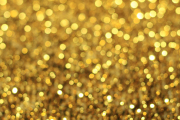 Glitter gold bokeh light abstract background