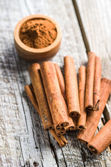 Cinnamon sticks and milled cinnamon spice.