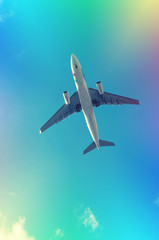 Fototapeta na wymiar Flying aircraft in the blue sky
