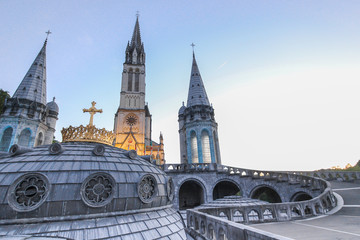 Fototapeta premium The gilded crown of the Lourdes Basilica