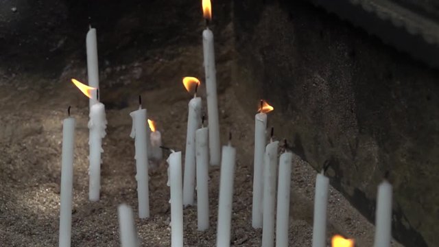 Ultra slow motion - Candles that burn for workship at church