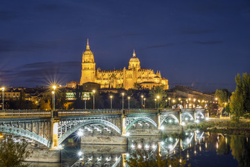 Fototapeta na wymiar Cathedral of Salamanca and bridge over Tormes river, Spain