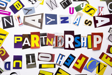 A word writing text showing concept of Partnership made of different magazine newspaper letter for Business case on the white background with copy space