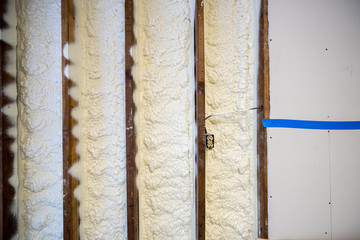 Closed cell spray foam insulation on a home that was flooded by Hurricane Harvey - obrazy, fototapety, plakaty