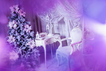 Christmas tree in retro style. The tree is decorated with flowers.