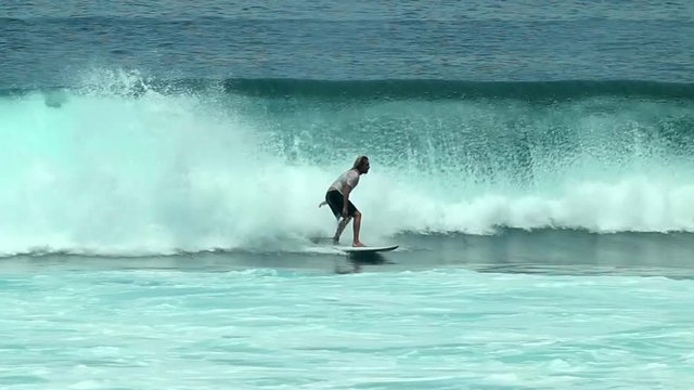 The guy goes surfing