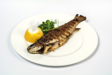 baked whole fish with lemon and salad