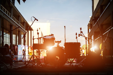silhouette of drum set on stage before concert