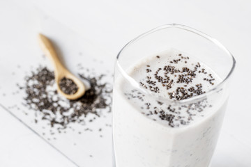 white cocktail with chia seeds, Salvia hispanica