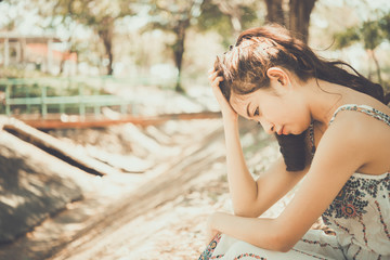 Close up sad beautiful asian woman from unrequire love,she think so much about boyfriend,life without love