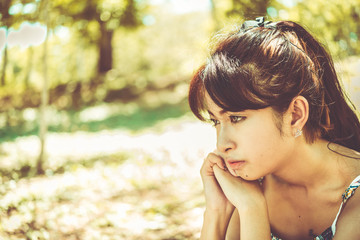 Close up sad beautiful asian woman from unrequire love,she think so much about boyfriend,life...