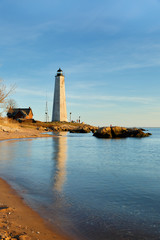 New Haven Light House at Lighthouse Point Park At Sunset. The lighthouse is dark, but the tower remains, greeting ships from around the world to New Haven, Connecticut, USA.