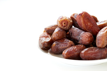 Dried Dates Fruits on dish white background