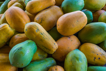 A pile of Holland papaya at the local flea market of northern Thailand for background