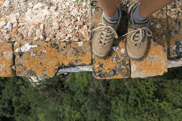 successful  hiker legs on the top of great wall