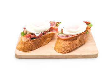 egg benedict on white background