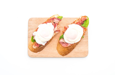 egg benedict on white background
