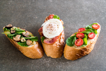bread with rocket mushroom, rocket tomatoes and bacon egg