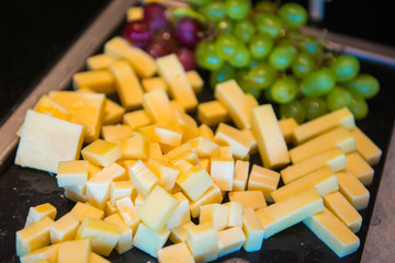 Pieces of cheese on buffet line