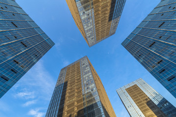 Fototapeta na wymiar Modern office buildings against blue sky.