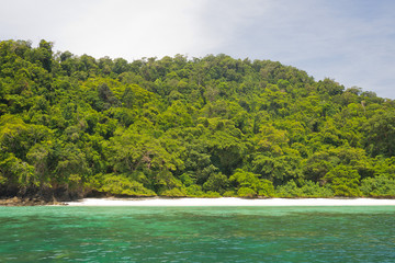 beautiful beach and sea with mountain background. Clear sea. Summer time. Relax on holidays. Travel