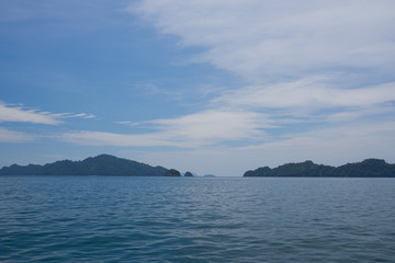 Fototapeta na wymiar beautiful beach and sea with mountain background. Clear sea. Summer time. Relax on holidays. Travel