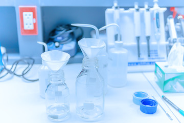 Equipment for science experiments on the laboratory table.
