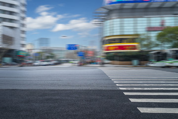 Empty urban road and modern skyline.