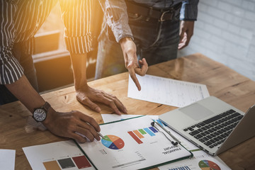 Young businessman and business partners are now finalizing sales