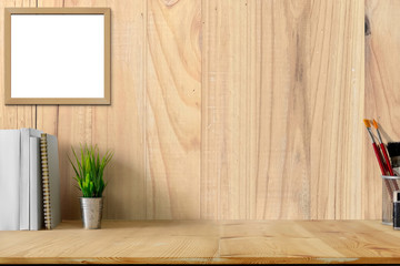 Mockup : Workspace poster or photo frame and supplies on table hipster minimalism loft desk space, copy space