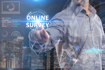 Business, Technology, Internet and network concept. Young businessman working on a virtual screen of the future and sees the inscription: Online survey