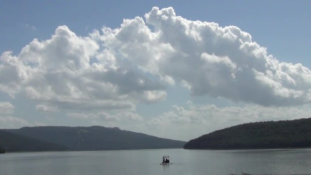 Fast Speed Tennessee River with Big Billowy Cloud and Mountains