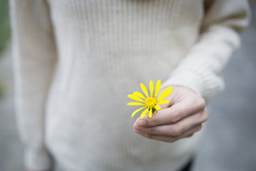 Women with yellow flower