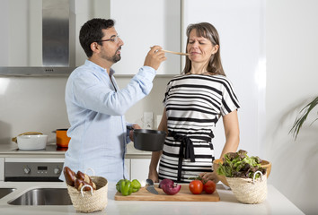 woman refusing to taste the food prepared by her husband 