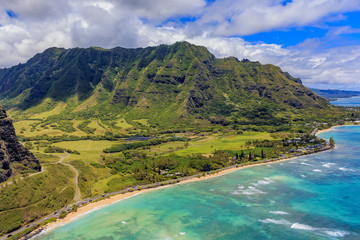 Fototapeta na wymiar Aerial view of Oahu coastline and mountains in Honolulu Hawaii