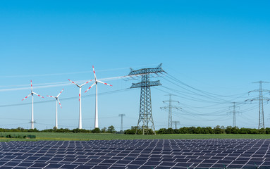 Solar energy panels, wind power and electricity pylons seen in Germany