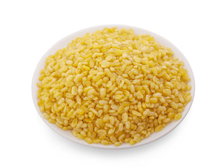 peeled split mung bean isolated on white background