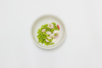 pepper and garlic in white bowl