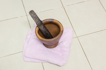 mortar and pestle on floor