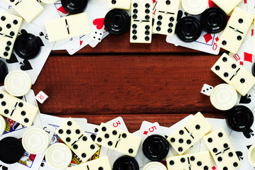 Various board games chess board, playing cards, dominoes. Hobby. Metaphor for games and gambling.
