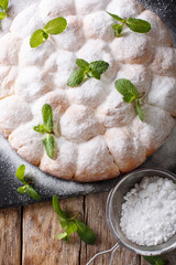 Austrian buchteln - sweet yeast rolls, delicious buns close-up. Vertical top view