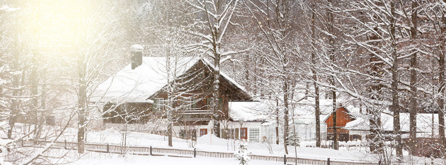 Fototapeta na wymiar Alpine village at snow winter