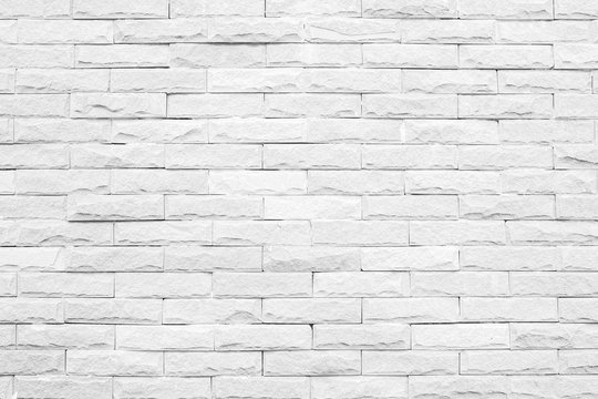 White brick wall background. gray texture stone concrete,rock plaster stucco; paint pastel masonry block pattern; Construction architecture indoor seamless design modern room. House Interior surface.