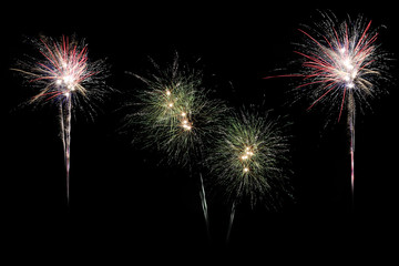 Colorful fireworks display isolated on black background.