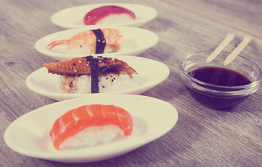 four kinds Nigirisushi on oval saucers