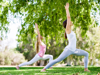 Young women exercising in the park