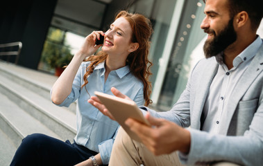 Picture of handsome businessman and attractive businesswoman